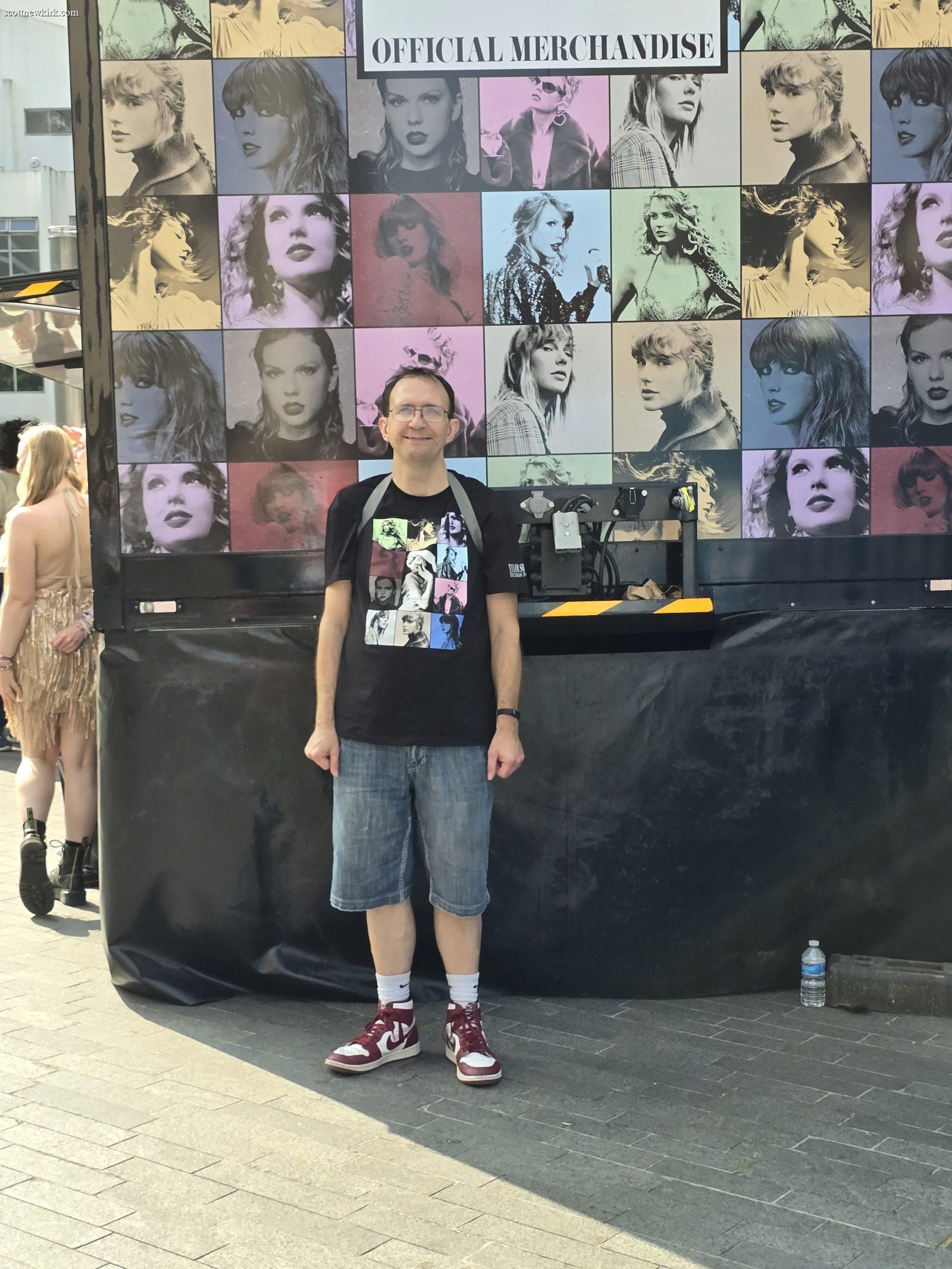 Scott at the Eras Tour merchandise wall in London